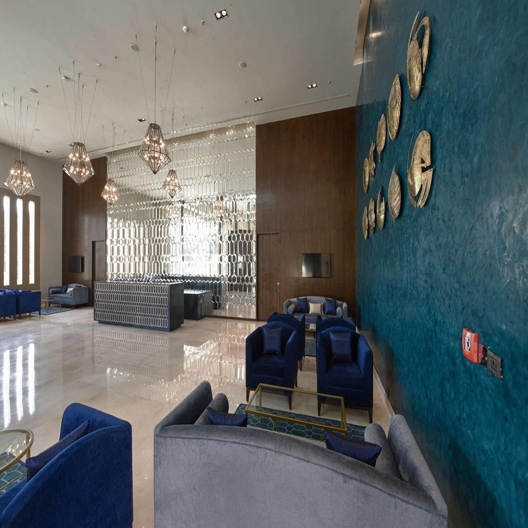 Marasa Sarovar Premiere Tirupati Exterior foto The lobby of the hotel